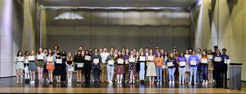 Fine Arts students holding certificates for Fine Arts Signing Day